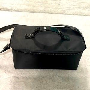 Black M.A.C makeup bag
